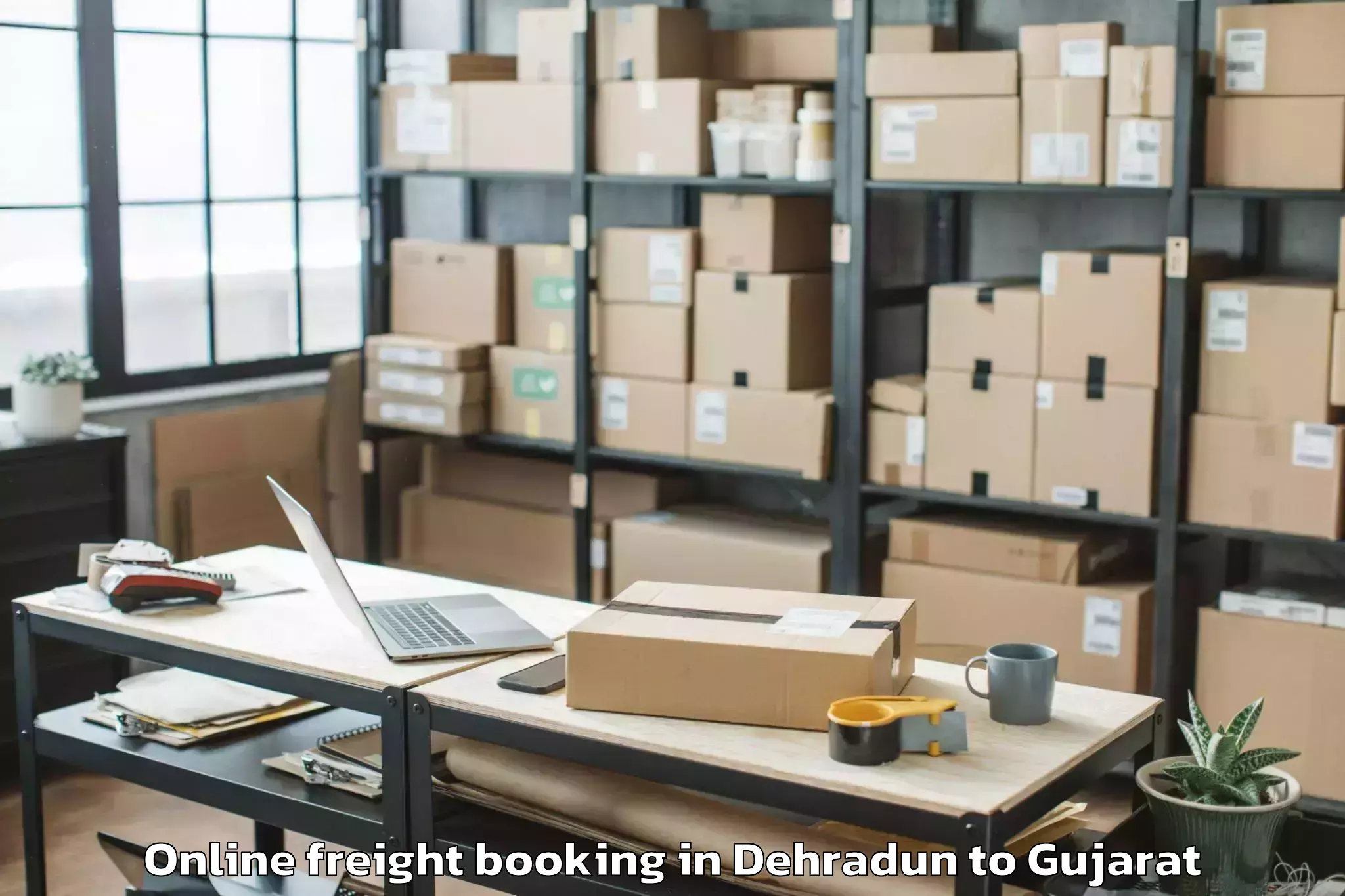 Get Dehradun to Dhuvaran Online Freight Booking